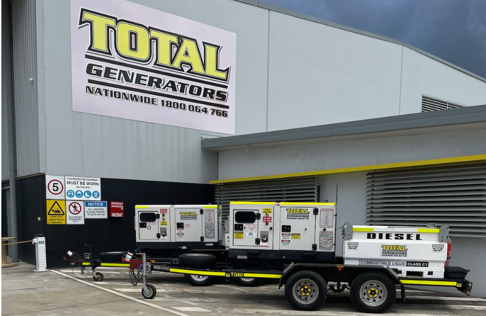 Generators mounted on a trailer outside of the Total Generators warehouse.