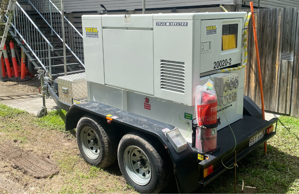 A Total Generators trailer-mounted generator meeting all Australian generator compliance outside of a residential home.
